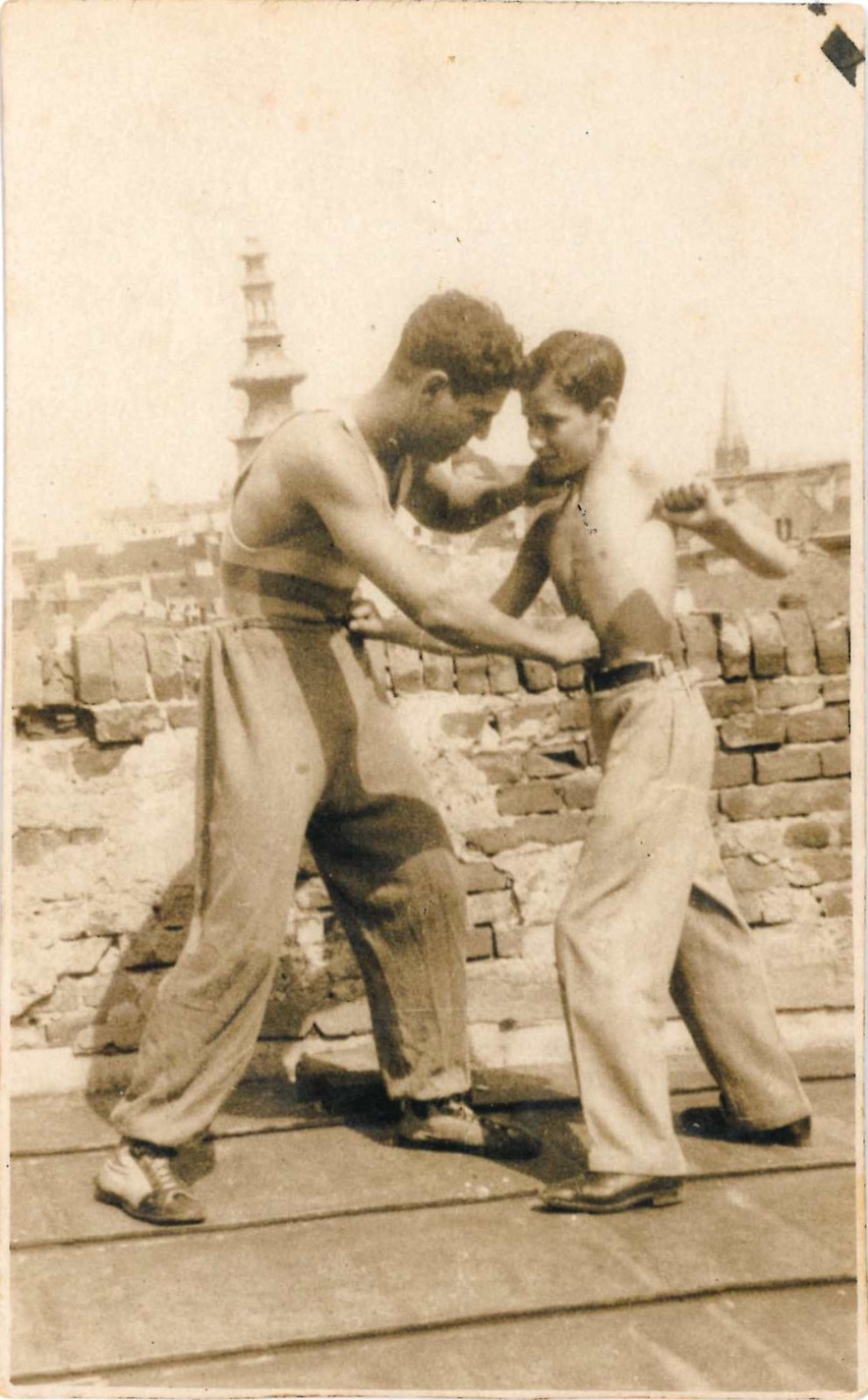 Wrestling demonstration with a younger boy, Bratislava, 1920s