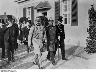 Carl Neuberg (fourth from right) walking in the background behind Kaiser Wilhem at the opening of the Kaiser Wilhelm Institute for Experimental Therapy in Dahlem in 1913.
