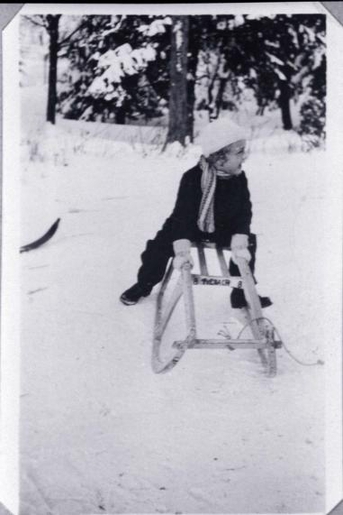 A child on a sled in Spindlermuehle