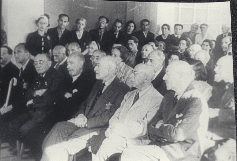 Group including Leo Baeck at Emil Utitz's lecture; Theresienstadt, 1944.