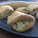 A freshly baked cheese knish