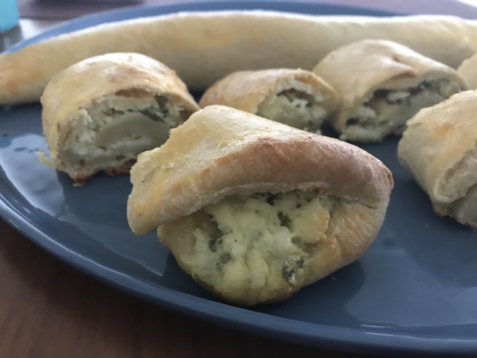 A freshly baked cheese knish