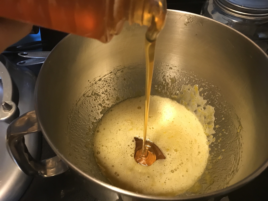 Adding lots of honey to the Lebkuchen