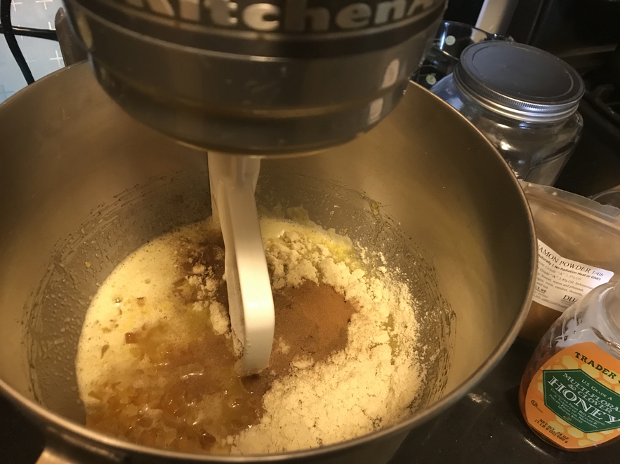 Adding spices and ground almonds to the Lebkuchen batter