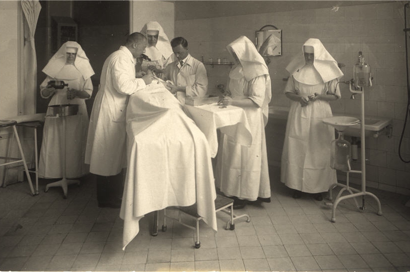 Catholic nuns assist with a surgery in a Vienna hospital