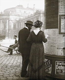 Emil Mayer - Man and Woman at an Advertising Column