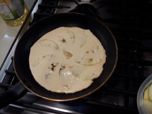 Adding the batter for the "Apfel-Eierkuchen"