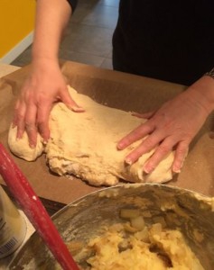 Working the dough of a knish